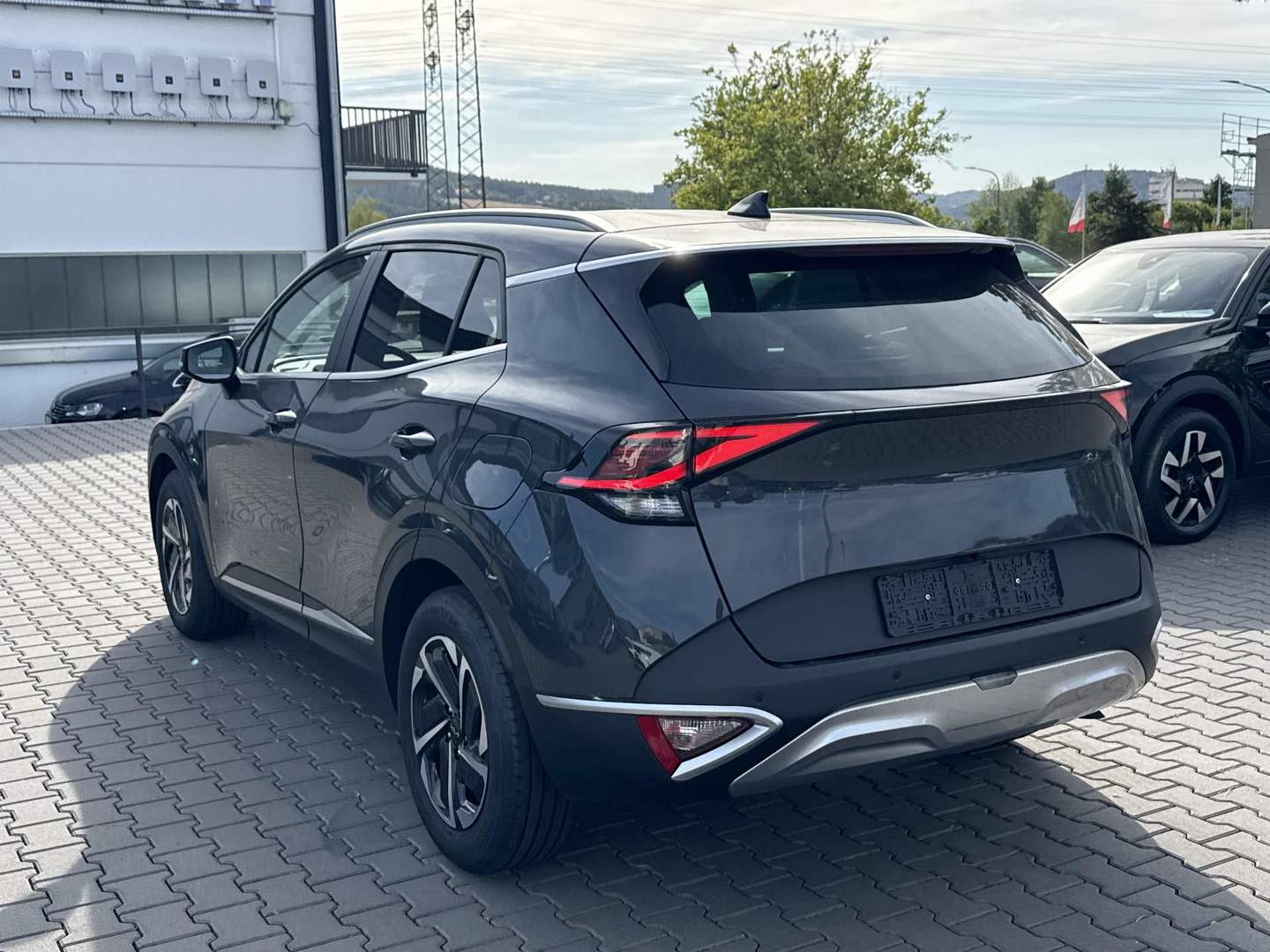 Kia Sportage 1,6 T-GDI 4WD DCT Vision photo